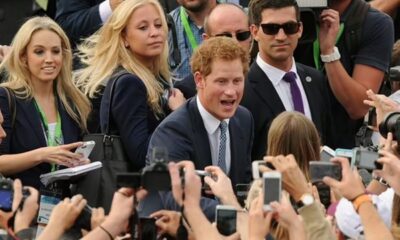 Prince Harry is mobbed by admirers