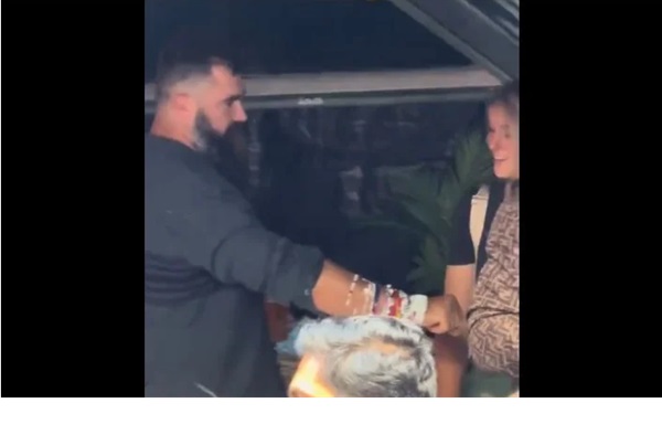 Jason Kelce shows his wife multiple bracelets