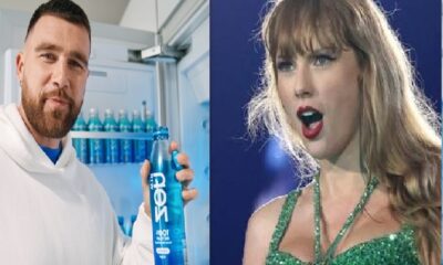 Travis Kelce holding a bottle water for Taylor Swift