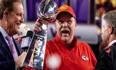 Andy Reid lifting trophy