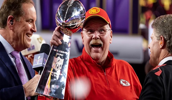 Andy Reid lifting trophy