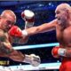 Usyk and Tyson Fury fight in ring,